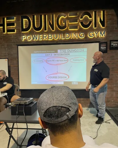 Broderick Chavez teaching the seminar room at The Dungeon Powerbuilding Gym