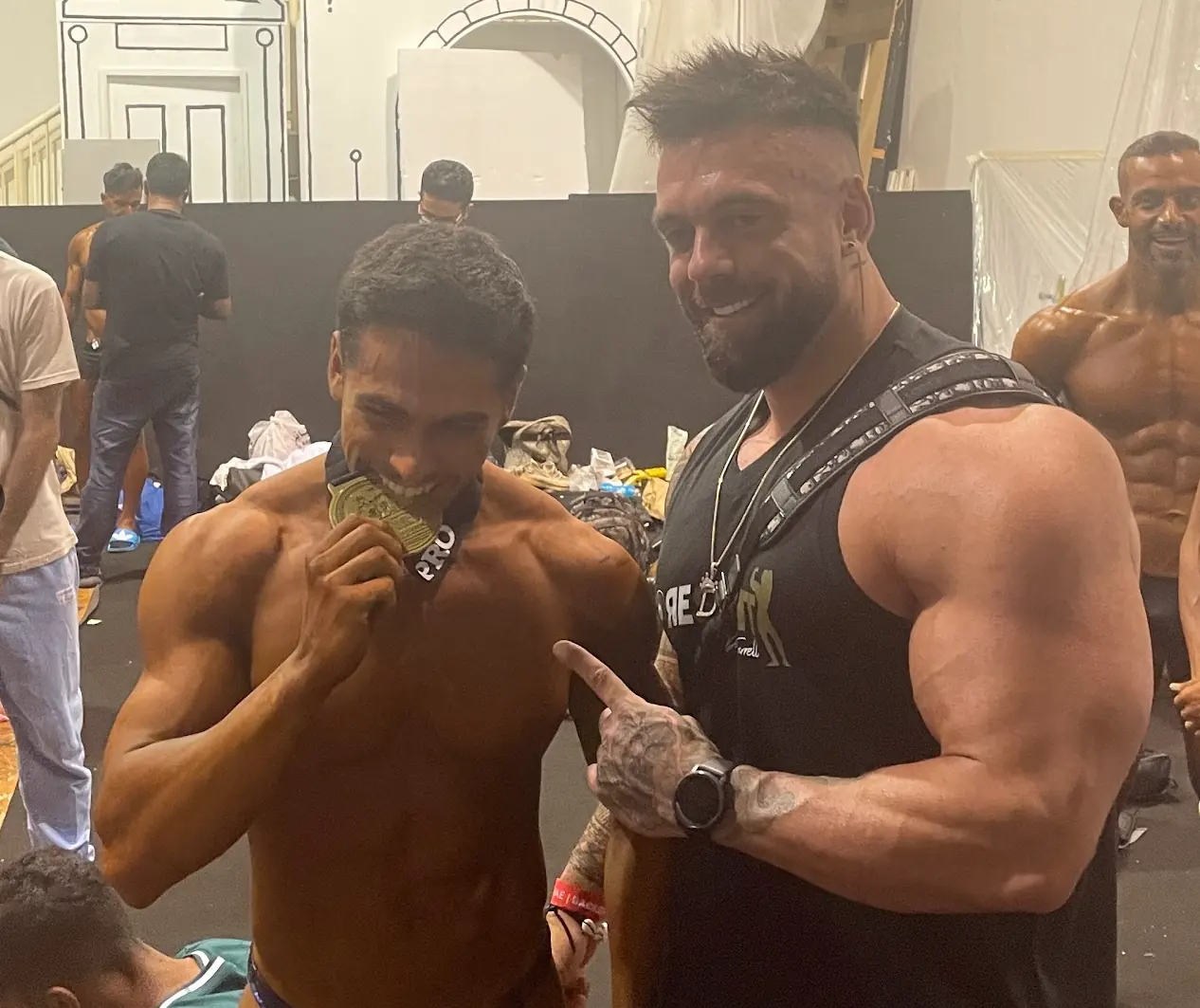 Emad backstage with IFBB Pro Darren Farrell