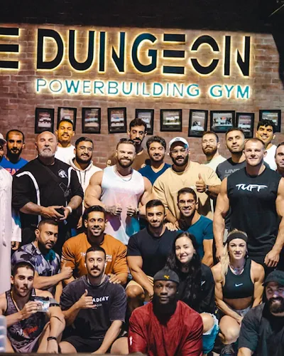 Victor Black with the seminar room at The Dungeon Powerbuilding Gym, Dubai