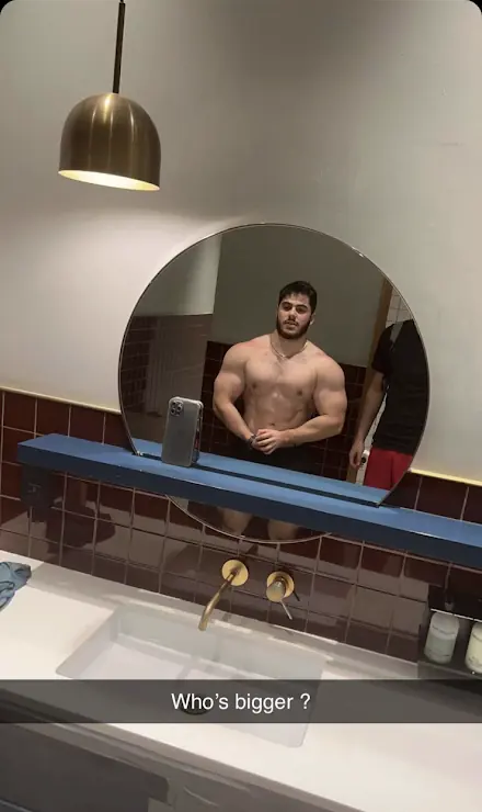 Mirror pose captioned "Who’s bigger?"