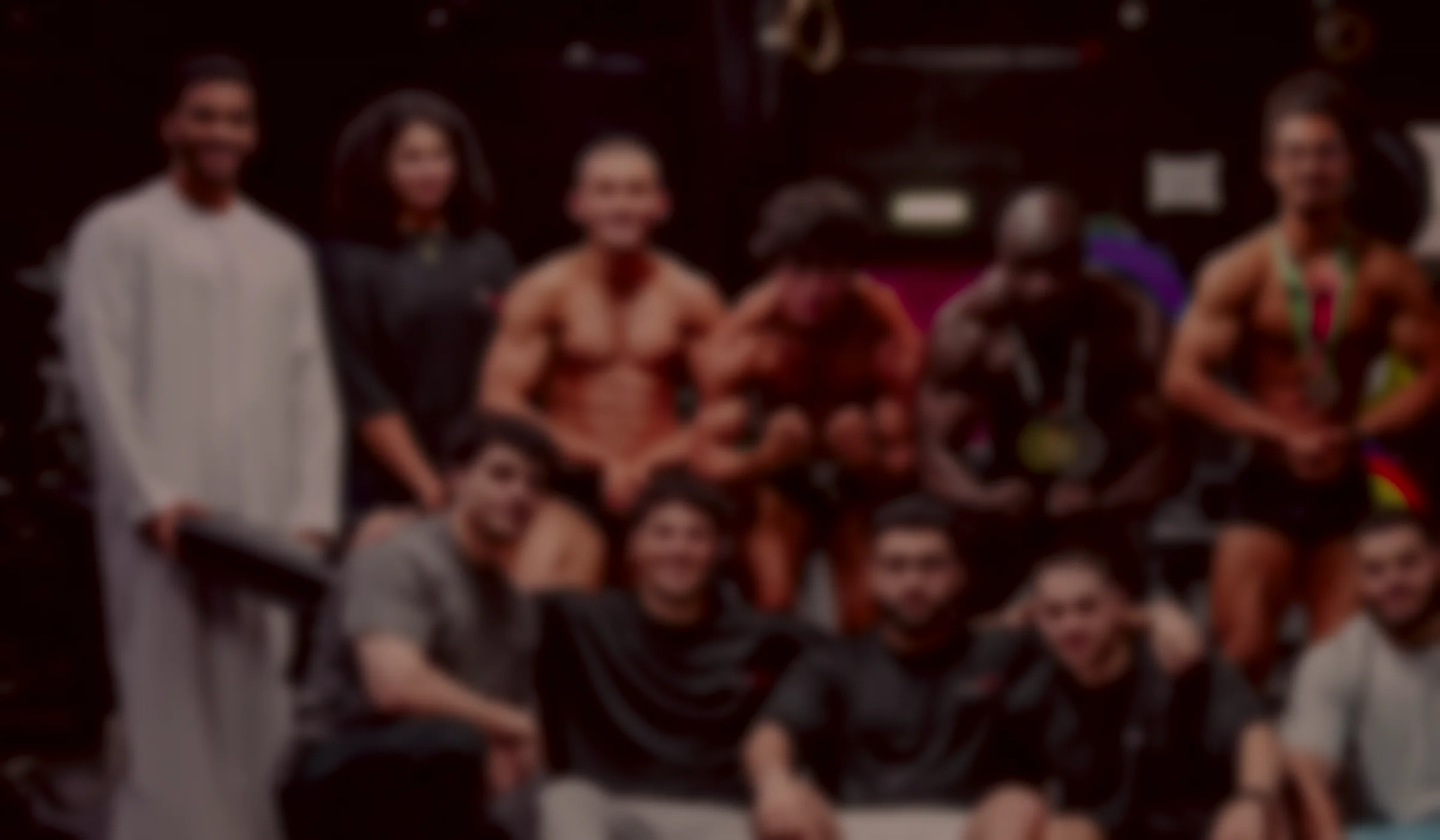 The Only Gains team on stage after the WNBF Gulf Super Pro